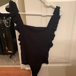 Forever 21 knit body suit. Never been worked. With tag